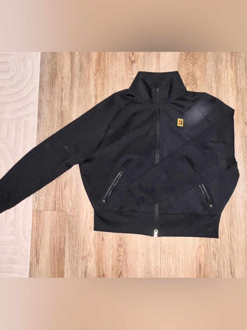 Nike Black Zip-Front Women's Jacket with Small Logo Patch